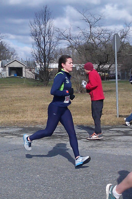 Emily Buzzell leads the coed division of the George Washington Birthday Marathon and Relay on the first leg.