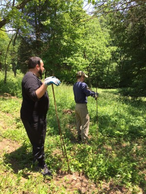 Kirk hard at work installing the fence!